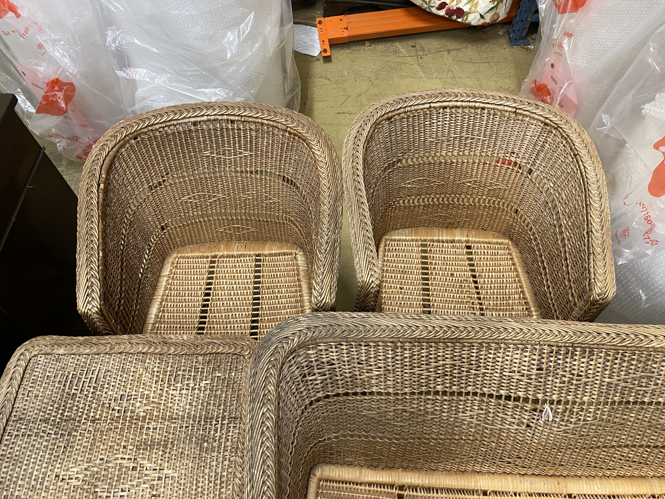 A vintage wicker four piece conservatory suite, settee length 122cm, depth 56cm, height 70cm